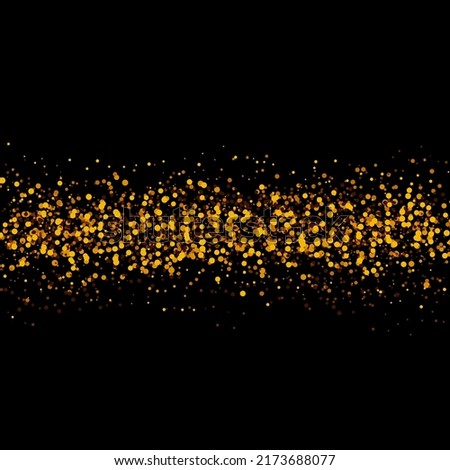 splash gold glitter stardust trail on black background.