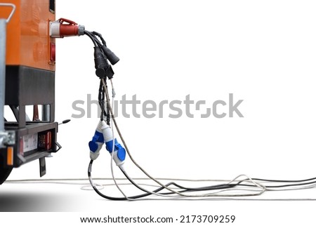 movable diesel electric generator on trailer with plugged wires is isolated on white background Royalty-Free Stock Photo #2173709259