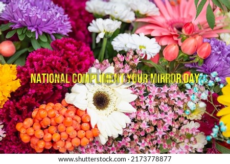 National Compliment Your Mirror Day - text, flowers, world holiday and International (copy space).