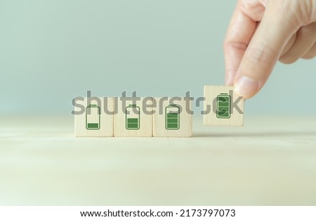 Motivation, professional, productivity, enthusiasm employee concept. Full level energy battery.  Fully charged active mentally healthy employee. Energetic business working. Happy and active working. Royalty-Free Stock Photo #2173797073