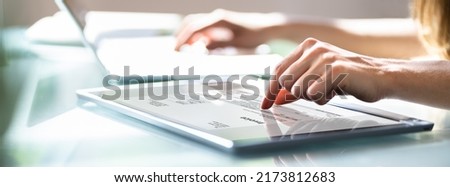 Digital Electronic Bill And Accountant E Invoice On Tablet Royalty-Free Stock Photo #2173812683