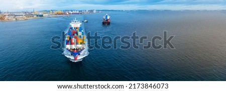 Aerial side view of cargo ship carrying container and running for export  import shipping freight  from  cargo yard port to custom ocean concept technology transportation , customs  forwarder mast