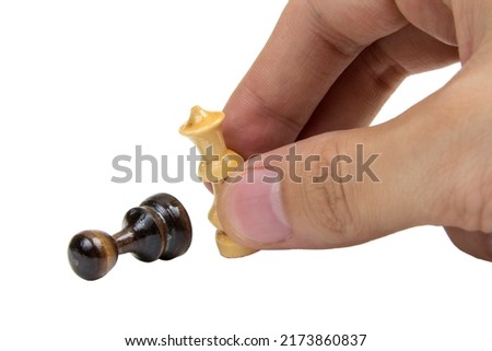 Hand of chess pieces isolated over white background