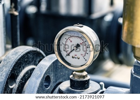 Pressure gauges mounted on the pipeline. Measuring instruments for pressure control. Royalty-Free Stock Photo #2173921097