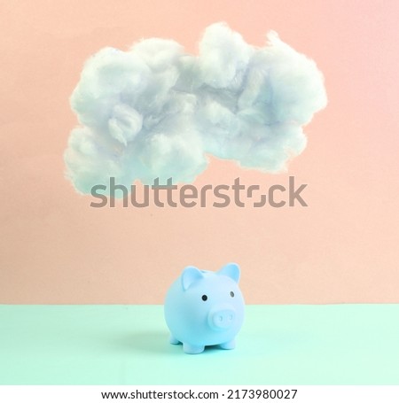 Piggy bank with cloud on pastel pink blue background. Invest or credit. Creative idea. Minimal concept. Pastel color trend