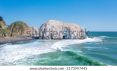 onstitucion and piedra iglesia view, chile, Aerial photo with horizontal drone of the sea shoreline beach and stones in the sea