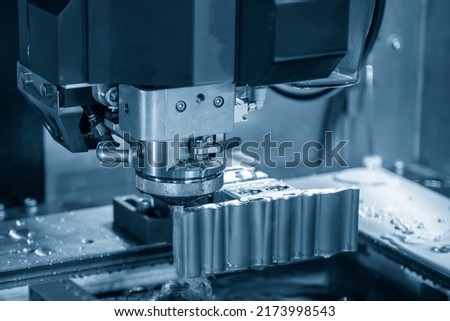 The wire EDM machine cutting the mold insert parts. The die insert cutting process by wire cut machine control by CNC program. Royalty-Free Stock Photo #2173998543