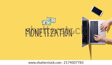 Monetization with person working with a laptop