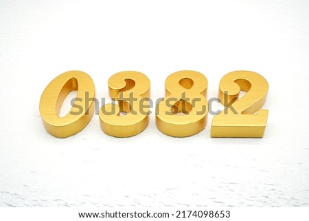     Number 0382 is made of gold-plated teak, 1 cm thick, laid on a white painted aerated brick floor, giving good 3D visibility.                                      