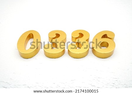  Number 0336 is made of gold-plated teak, 1 cm thick, laid on a white painted aerated brick floor, giving good 3D visibility.                                   