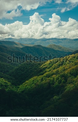 Smoky Mountains on spring day with beautiful, dramatic clouds Royalty-Free Stock Photo #2174107737