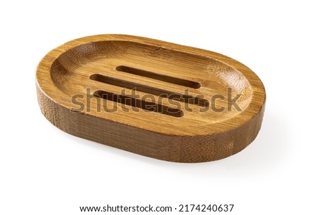 Wooden soap dish isolated on a white background. Empty rounded bamboo soap holder cutout. Eco-friendly bathroom accessories. Plastic free lifestyle. Living green concept. Front view. Royalty-Free Stock Photo #2174240637