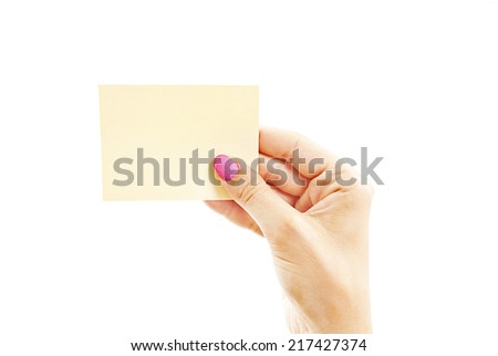 Female hand with pink nails holding a blank card. Isolated on white background 
