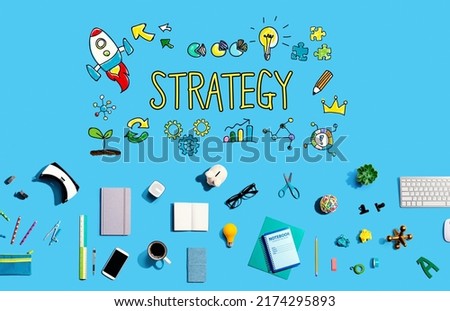 Strategy with collection of electronic gadgets and office supplies