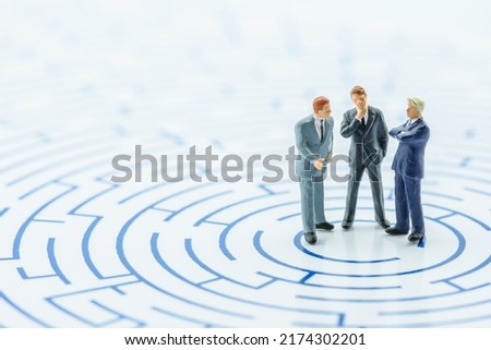 Business challenge and problem solving concept : Top executive management team brainstorm and discuss or exchange idea to pull company from difficult situations in a fast-changing business environment Royalty-Free Stock Photo #2174302201
