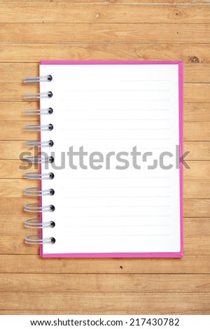 notebook on wood for background and text