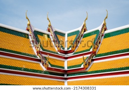 Wat Suthat Thep Wararam is a temple in Bangkok, Thailand, ancient architecture with patterns, beautiful colors, cultural identity.