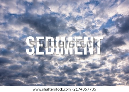 SEDIMENT - word on the background of the sky with clouds.