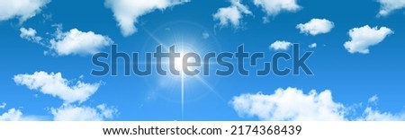 Panoramic blue sky, sunny day. Clouds on blue sky background.