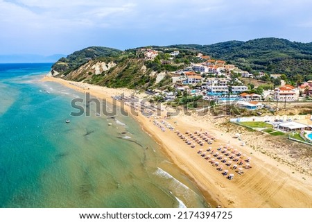 Aerial drone view of Agios Stefanos beach, a small tourist resort on the north east coast of Corfu in Greece. Royalty-Free Stock Photo #2174394725