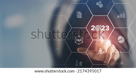 2023 Goal plan action, Business plan and strategies. Business annual plan and development for achieving golas. Goal acheiveement and success in 2023. Businessman showing 2023 business target icon. Royalty-Free Stock Photo #2174395017