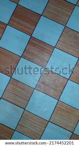 The white chocolate chessboard patterns on the floor
