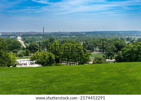 Skyline of Washington D.C. as seen from Arlington House in Arlington National Cemetery. Washington Monument, Lincoln Memorial and Arlington Memorial Bridge. 