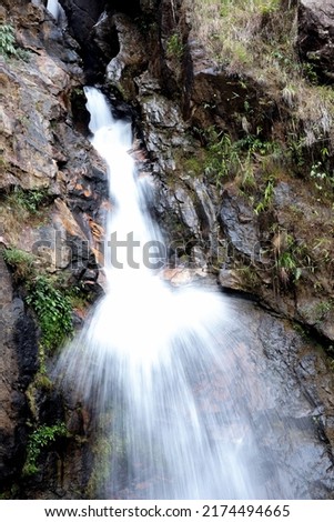 The close up view of Jogkadin waterfall kanchanaburi, Thailand. Fresh water splashes under the waterfall close up.
