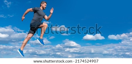 Man running and jumping, banner with copy space. energetic man athlete with muscular body run in sportswear outdoor on sky background, motivation.