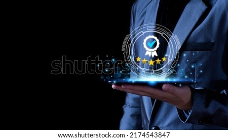 Quality Assurance Concept. Business people show high quality assurance mark, good service, premium, five stars, premium service assurance, excellence service, high quality, business excellence. Royalty-Free Stock Photo #2174543847
