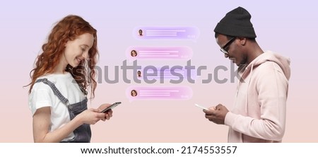 Social media and relationships concept. Diverse couple, ginger headed girl and black guy using phones sending and reading messages in text bubbles, standing against pink background facing each other Royalty-Free Stock Photo #2174553557