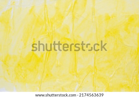 Abstract yellow watercolor on crumpled and creased paper texture background