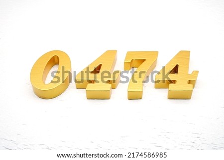     Number 0474 is made of gold-plated teak, 1 cm thick, laid on a white painted aerated brick floor, giving good 3D visibility.                                 