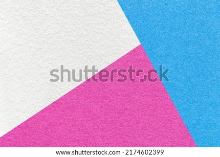 Texture of craft white, blue and purple shade color paper background, macro. Structure of vintage abstract cardboard with geometric shape and gradient. Felt backdrop closeup.