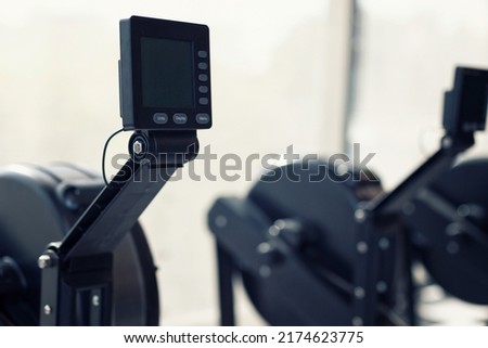 Close Up of a Rower in a gym (focus on the left rower)