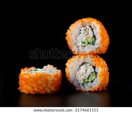 Sushi California Roll on black background