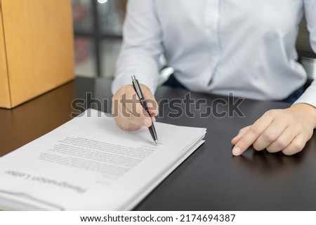 Sign the termination contract, resignation letter sign, End of the employment contract or termination of employment, Move to a new job, Take the pressure of the work that can't be done, Resignation.