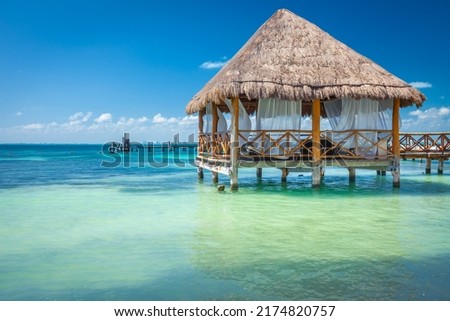 Relaxing Palapa in Caribbean sea - Isla Mujeres, Cancun -Mexico Royalty-Free Stock Photo #2174820757