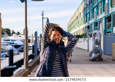 Woman posing in Sydney Bay