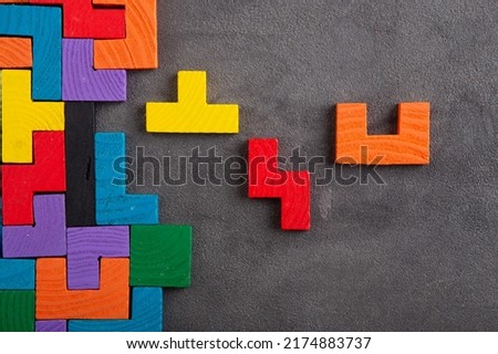 Creative idea solution - business concept, jigsaw puzzle close up. Leadership and teamwork strategy success. Royalty-Free Stock Photo #2174883737