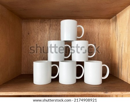 coffee mugs on the shelf