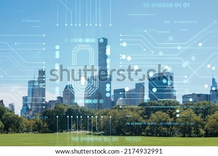 Green lawn at Central Park and Midtown Manhattan skyline skyscrapers at day time, New York City, USA. The concept of cyber security to protect confidential information, padlock hologram Royalty-Free Stock Photo #2174932991