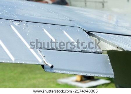 Close up image of an airfoil of an old aircraft Royalty-Free Stock Photo #2174948305