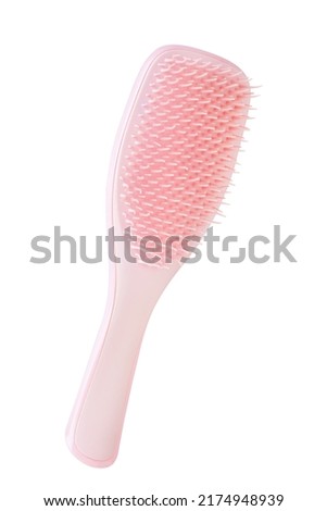pink hairbrush isolated on white background. pink hair brush cut out. design element. personal grooming assessor