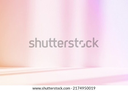 Abstract pink studio background for product presentation. Empty room with shadows of window. Display product with blurred backdrop.