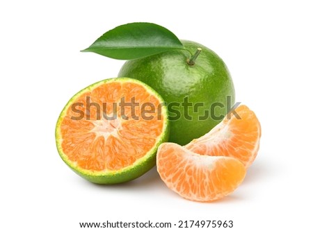 Tangerine orange with cut in half isolated on white background. Clipping path. Royalty-Free Stock Photo #2174975963