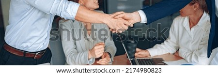 Business male partnership handshake. Photo handshaking process. Successful deal after meeting.