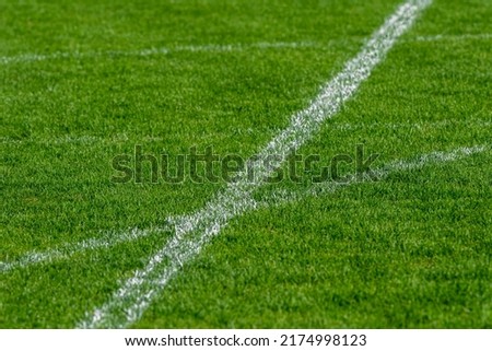 White lines on green grass.Horizontal sport theme poster, greeting cards, headers, website and app