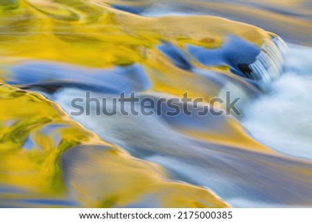Abstract landscape of the Presque Isle River rapids captured with motion blur, Porcupine Mountains Wilderness State Park, Michigan's Upper Peninsula, USA 