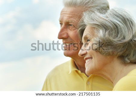 Elderly couple relaxing on a sunny day together